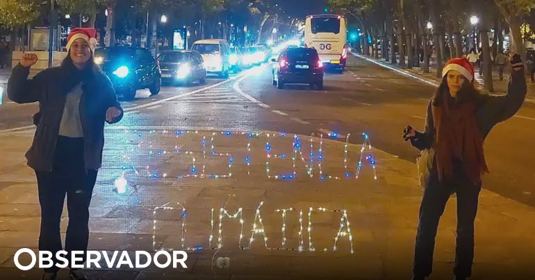 Activists in Lisbon Turn Off Christmas Lights to Protest Climate Change